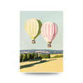 Illustration of two hot air balloons flying over a landscape with trees and a field.