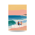 Illustrated travel poster of two surfers with boards entering the surf at sunset with a warm yellow and pink sky, text reads "BONDI AUSTRALIA".
