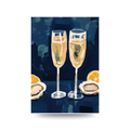 Two champagne glasses with lemon slices and oysters on a blue background