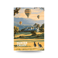 Poster of a homestead with kangaroos and hot air balloons.