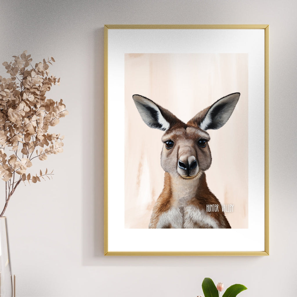 Framed artwork of a kangaroo on a wall with decorative elements.