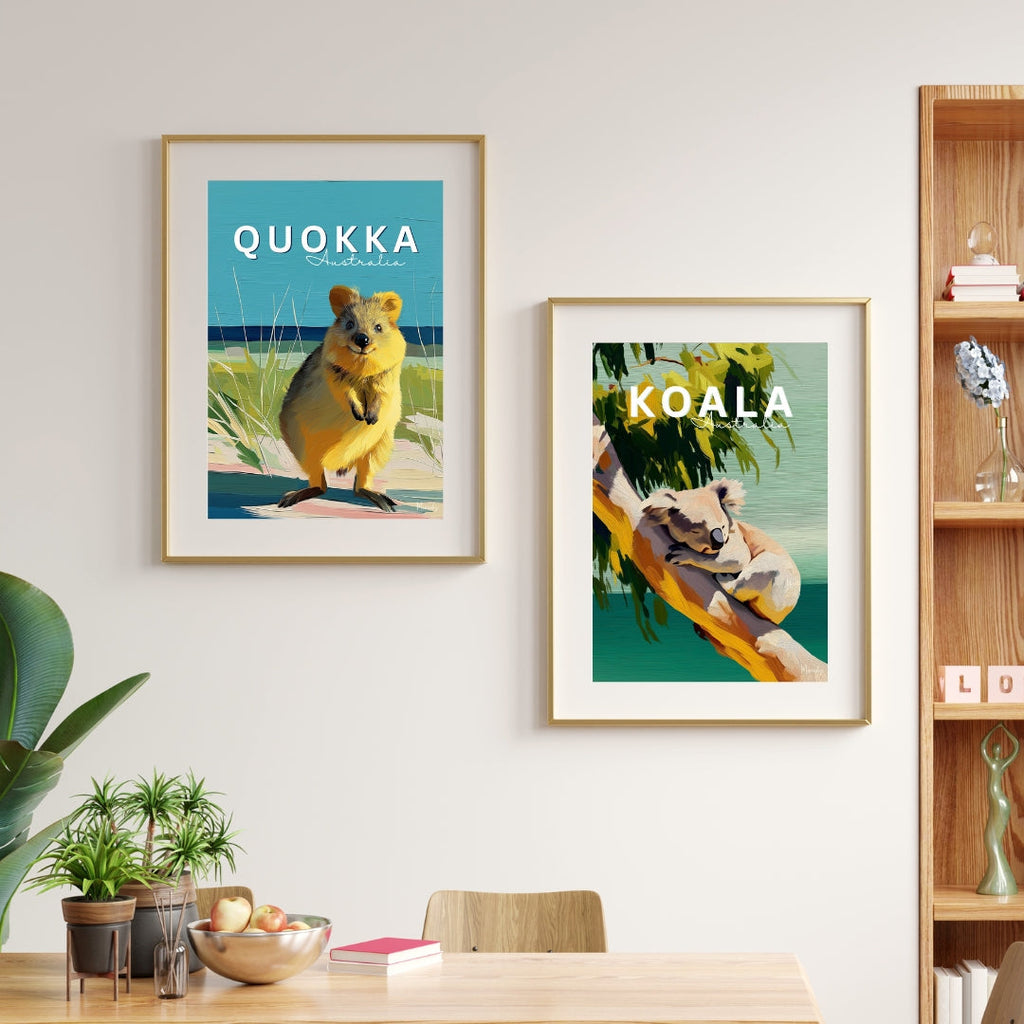 Dining room with framed prints of a quokka and a koala, a wooden table, and chairs.