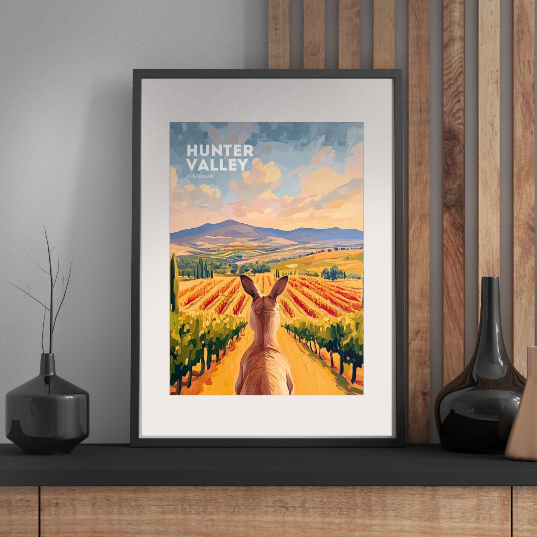 Framed artwork of a kangaroo in a vineyard with 'Hunter Valley' text, displayed on a wall.